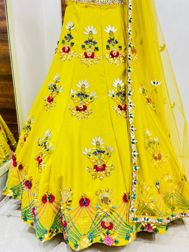 Yellow Heavily Embroidered Raw Silk Lehenga