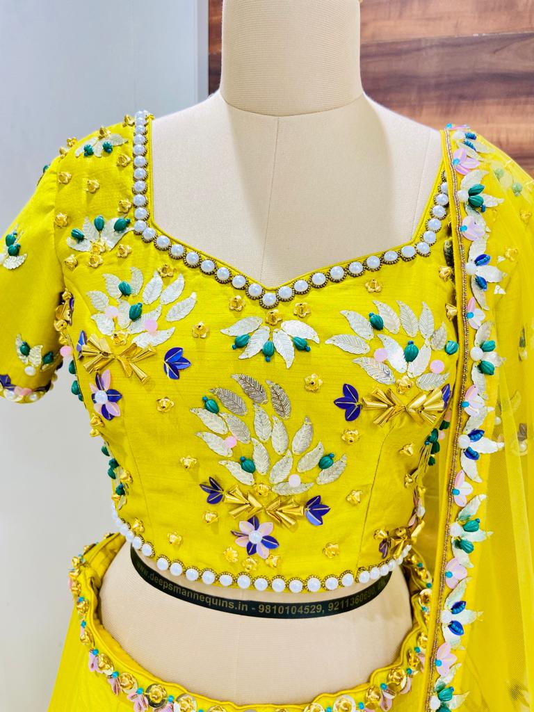 Yellow Heavily Embroidered Raw Silk Lehenga