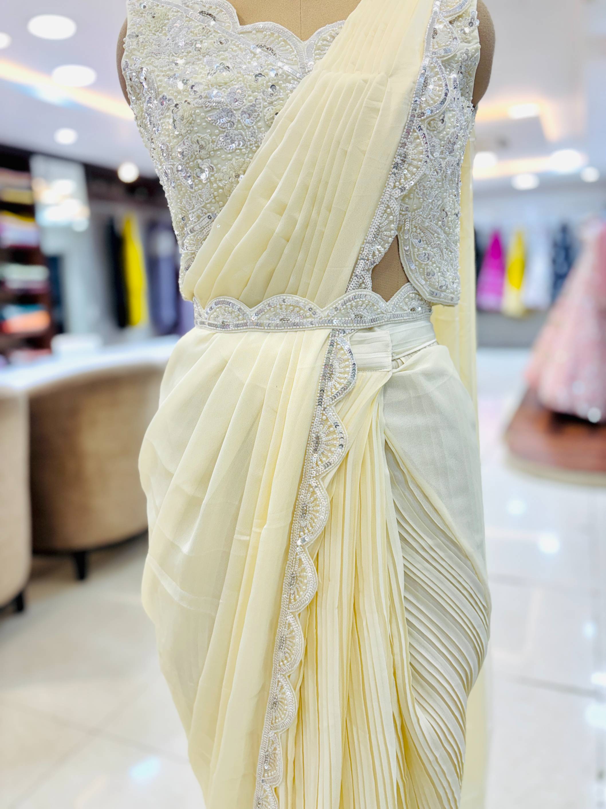 Cream Premium Chinnon Embellished Pre Drape Saree